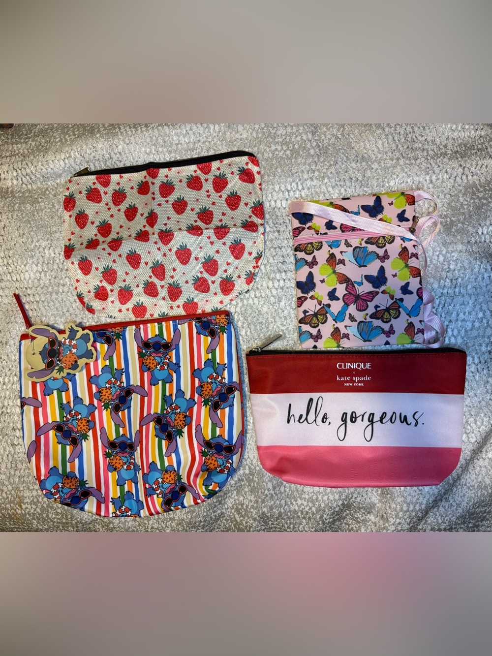 Bundle of new 4 cosmetic bags. New with and without tags